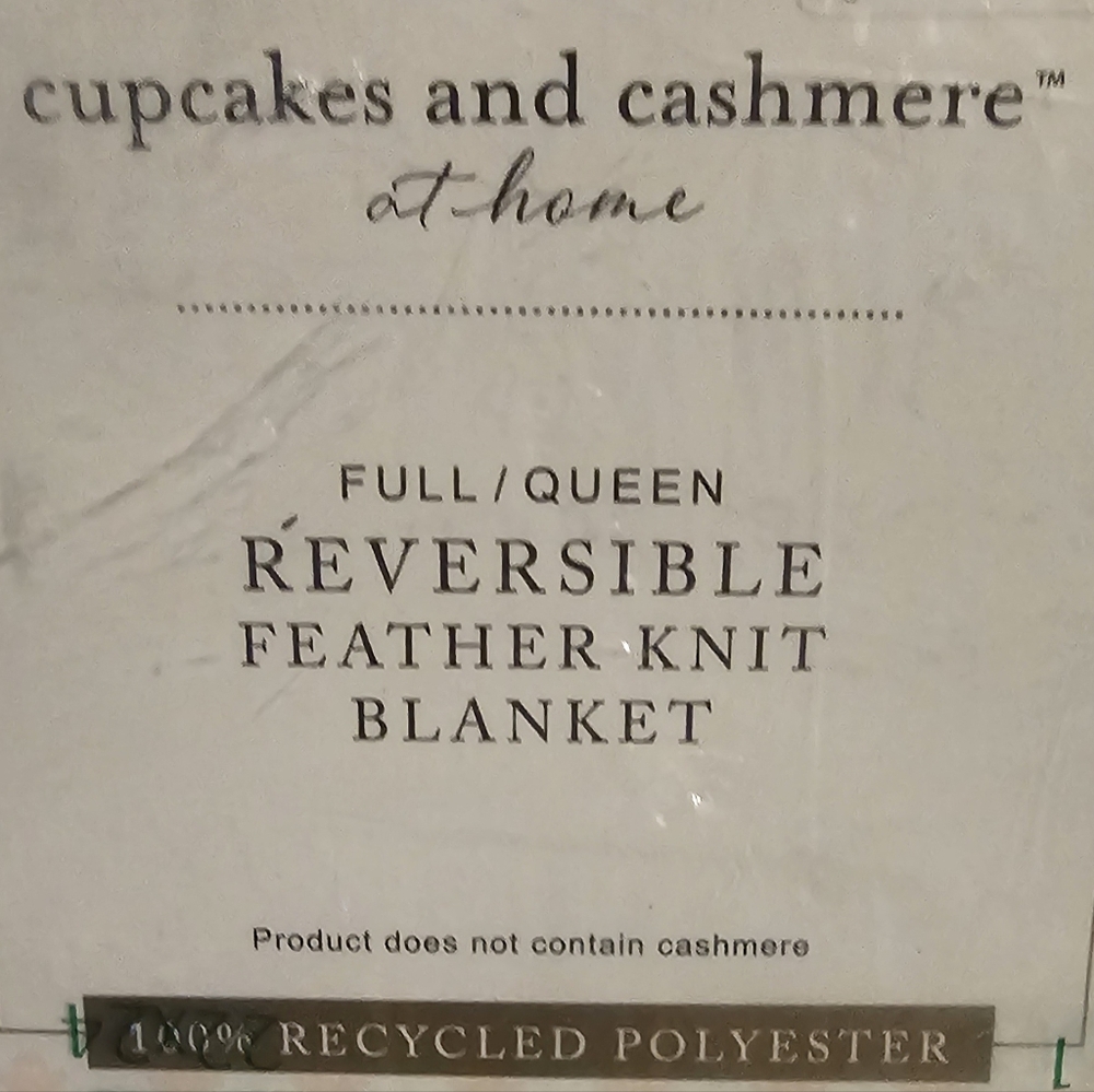 Cupcakes & Cashmere Pink and White Feather-Knit Blanket.